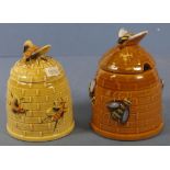 Two similar beehive form ceramic honey pots