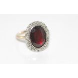 Vintage 9ct rose gold, garnet and diamond ring