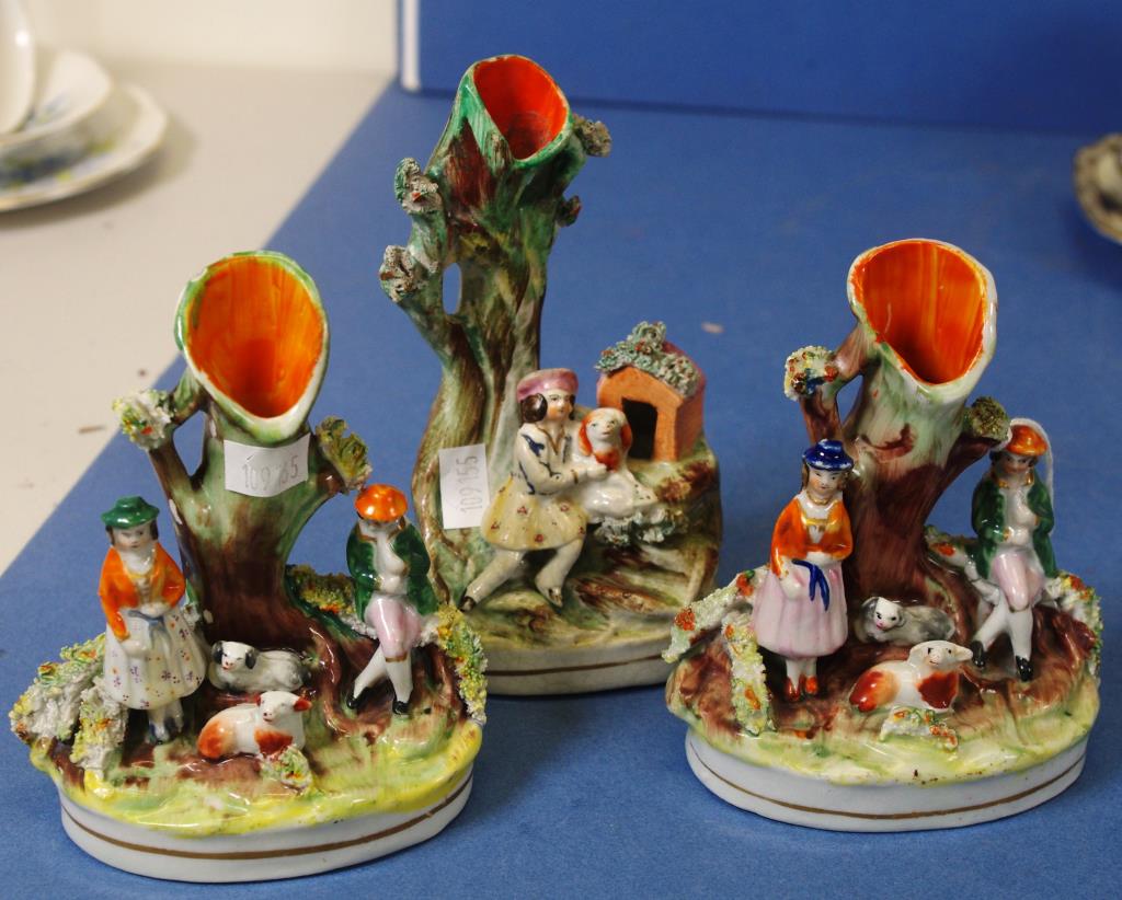 Three Staffordshire figural spill vases