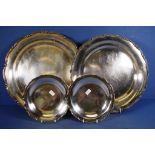 Four Egyptian silver trays