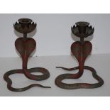 Pair of brass Cobra candlesticks