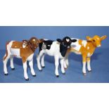 Three various Beswick standing calf figures