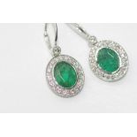 Platinum, emerald and diamond earrings