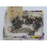 Quantity of vintage earrings and brooches