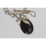 Silver, pearl and black onyx pendant