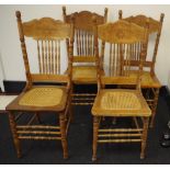 Four antique American spindle back chairs