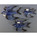 Graduated set three blue swallow wall vases