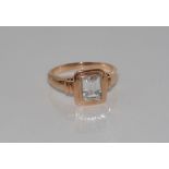 9ct rose gold ring with good emerald cut CZ