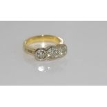 18ct yellow gold and three diamond gold ring