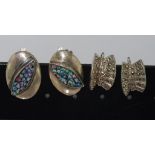 Scanda silver clip earrings set with opal