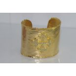 Large costume cuff with cross