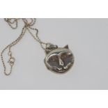 Silver cat face locket on silver chain