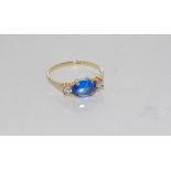 9ct yellow gold ring with sapphire and CZ