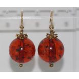 Vintage 9ct gold earrings set with amber