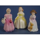 Three Royal Doulton girl figurines