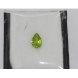 Unset tear drop shaped peridot