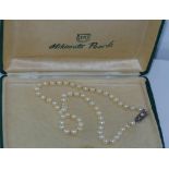 Boxed Mikimoto pearl necklace