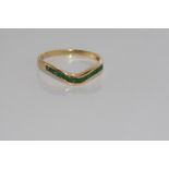 14ct yellow gold channel set emerald ring
