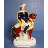 Antique Staffordshire man on horseback figure