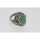 Silver, green stone ring