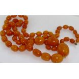 Vintage opera length butterscotch amber necklace