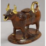 Antique brown glazed cow creamer