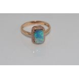 14ct rose gold and black opal ring