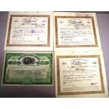 Four vintage share certificates