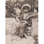 Gloeden, Wilhelm von: Young boy with dog Young boy with dog. Circa 1900. Albumen print. 22,8 x 16,