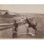 Ermakov, Dimitri N.: Water seller with his horse in Tiflis Water seller with his horse in Tiflis.