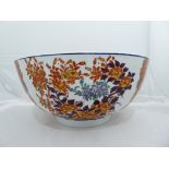 A C19th Meiji Period Japanese large Imari bowl with floral and guard sectional banding interior with