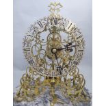 A brass Skeleton Clock in the manner of James Smith and Sons (1845),