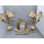 A 19th century marble and ormolu Clock with Classical female figure and cherub with dog with