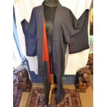 A 1960s traditional Japanese kimono in pongee silk and wool. Sophisticated navy blue with red and