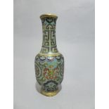 A C18th/C19th Chinese Cloisonne stem vase, with copper rim and splayed base, with petal rim and