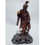 C19th Chinese root wood statue of a man, carrying fish, missing fishing rod