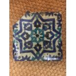 A C18th Iznik tile with cobalt blue with overall foliate design