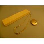 A 9ct gold locket and chain, together with a seed pearl sea shell chain