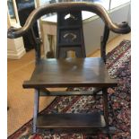 An early 20th century Chinese hardwood horseshoe Throne Chair with footrest . H86.5cm W53cm D58cm