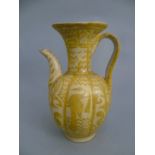 An Islamic ceramic pottery , the yellow glaze with decorated with birds and fleur du lys, the