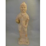 A large Tang Dynasty pottery figure of a soldier, with traces of pigment H53cm W15.5cm