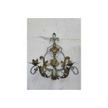 Pair of French wrought iron and triple candle gilt and distress painted wall sconces with foliate