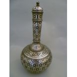 An C18th/early C19th Indo-Persian fine Bidri vase with cover the silver inlay depicting repeating