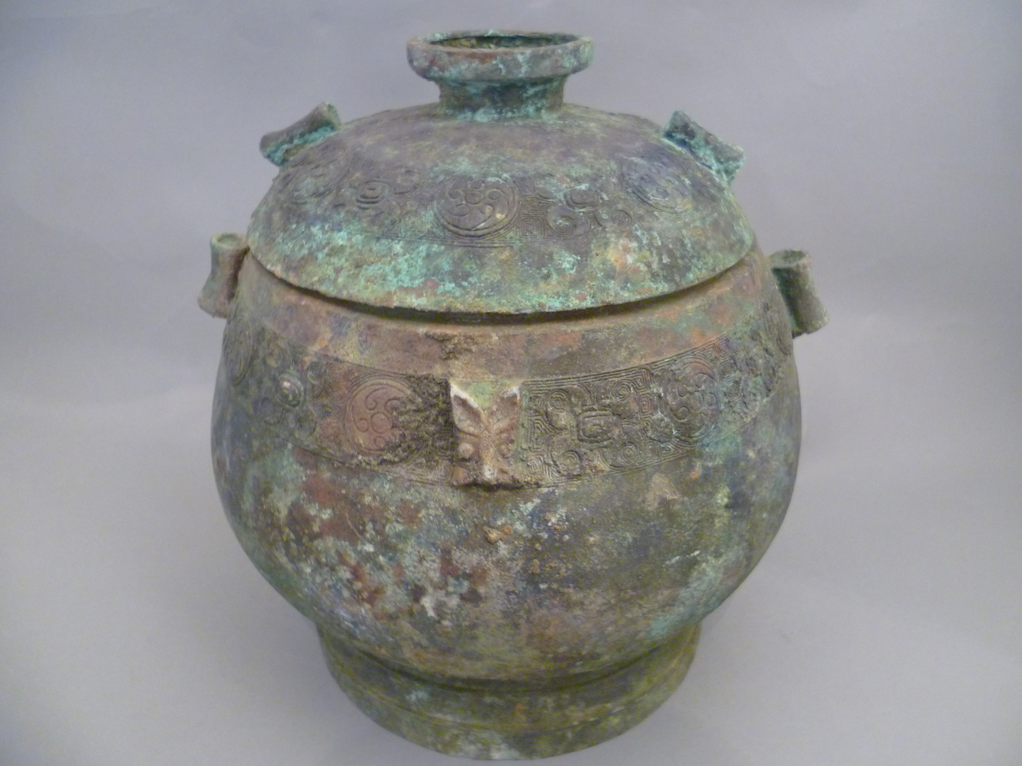 A Chinese archaic bronze bulbous round vessel with cover (possibly Ming Dynasty) the tubular handles