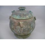 A Chinese archaic bronze bulbous round vessel with cover (possibly Ming Dynasty) the tubular handles