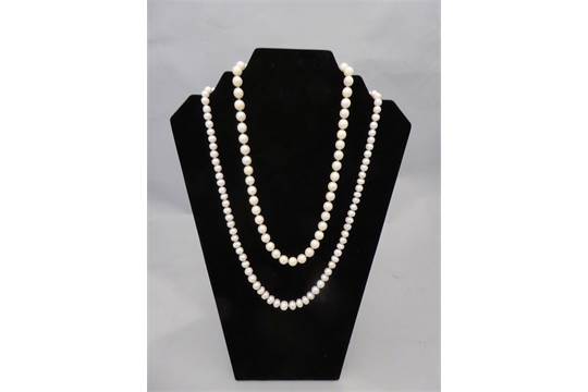 A cultured pearl necklace with rose gold amethyst and pearl clasp, together with another necklace of