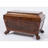 A Victorian mahogany cellarette:, of sarcophagus shaped outline with reel turned mouldings,