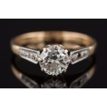 A diamond solitaire ring: the circular, brilliant-cut stone approximately 6.4mm wide x 3.