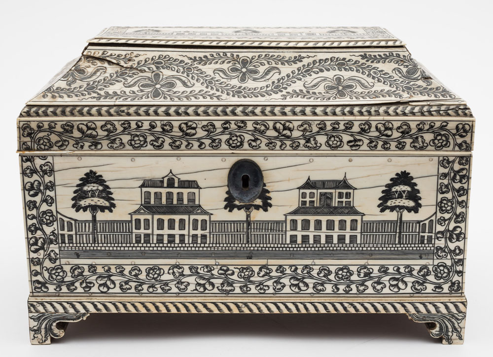 An Anglo-Indian stained ivory tea caddy: decorated on each side with colonial buildings in