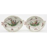 A pair of large Worcester cabbage leaf dishes: painted with fancy birds,